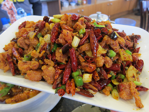 cubed fried chicken in spicy sauce