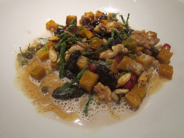 pumpkin with raisins, pom seeds, pumpkin seeds, brown butter