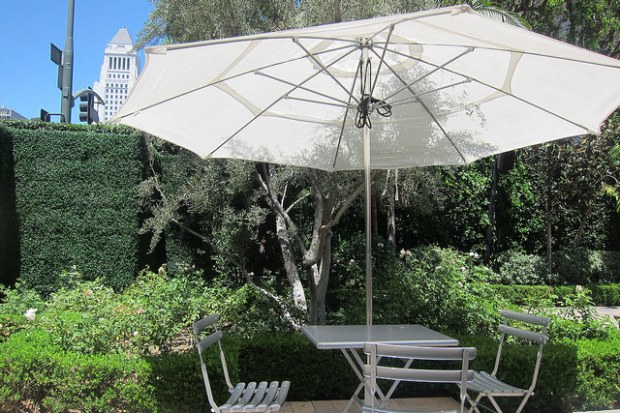 lovely patio seating at Vibiana, City Hall is in the background