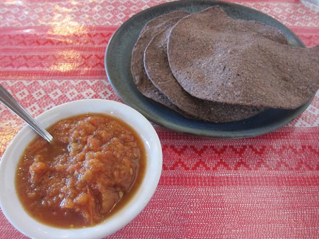handmade blue corn chips and salsa